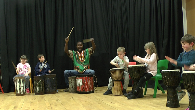 Su Grierson, Drumming with Junior street Dance group Perth.